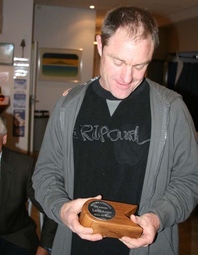 Leith Armit, four times World OK Champion admires his OK hall of Fame trophy. Photo: Peter Menzies © NZ OK Dinghy Assoc